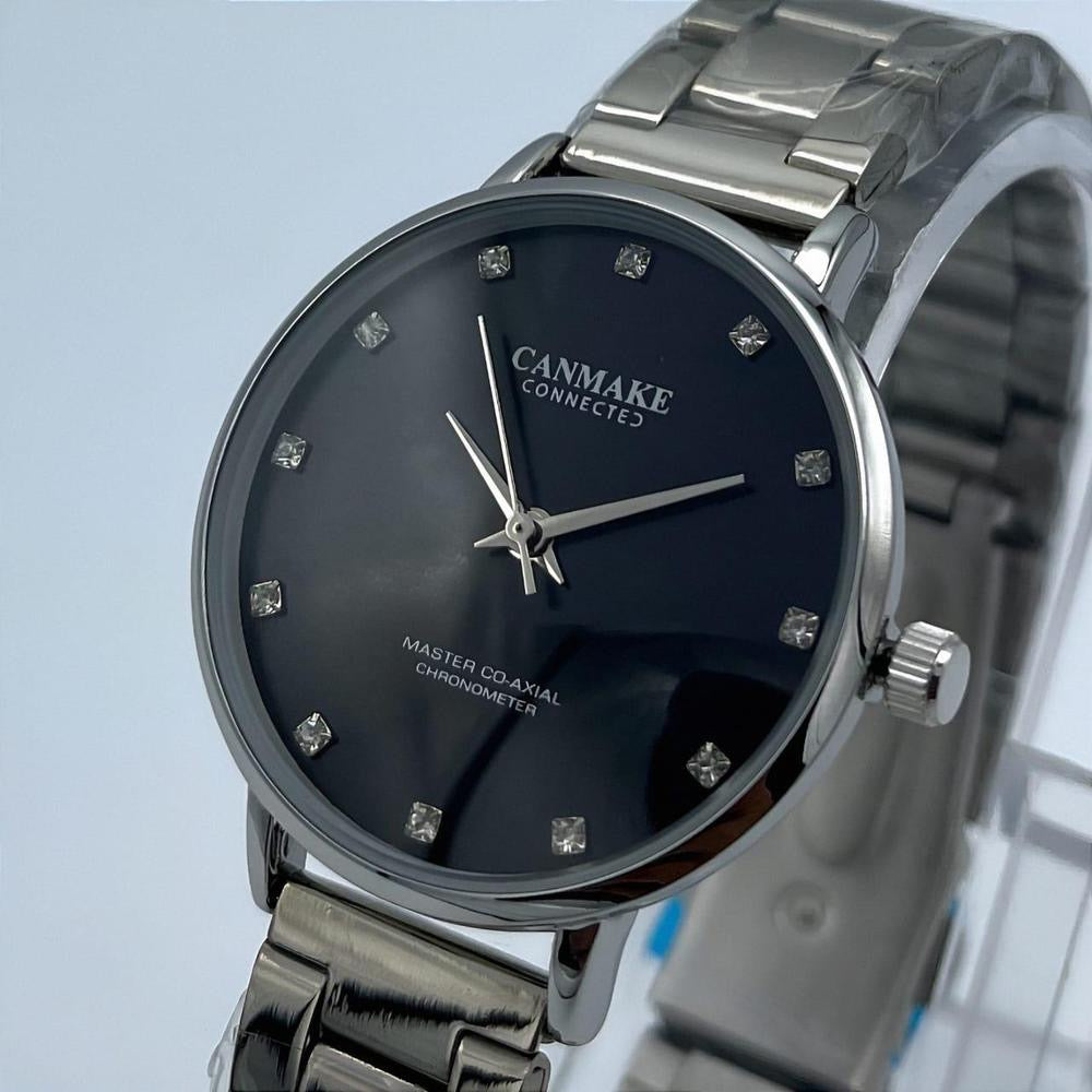 Woman stainless steel Analogue watch dark blue crystal markers
